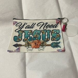 Cosmetic Bag with graphics “Y’all Need Jesus”; size: 7 3/4” x 5 1/2”. NWOT